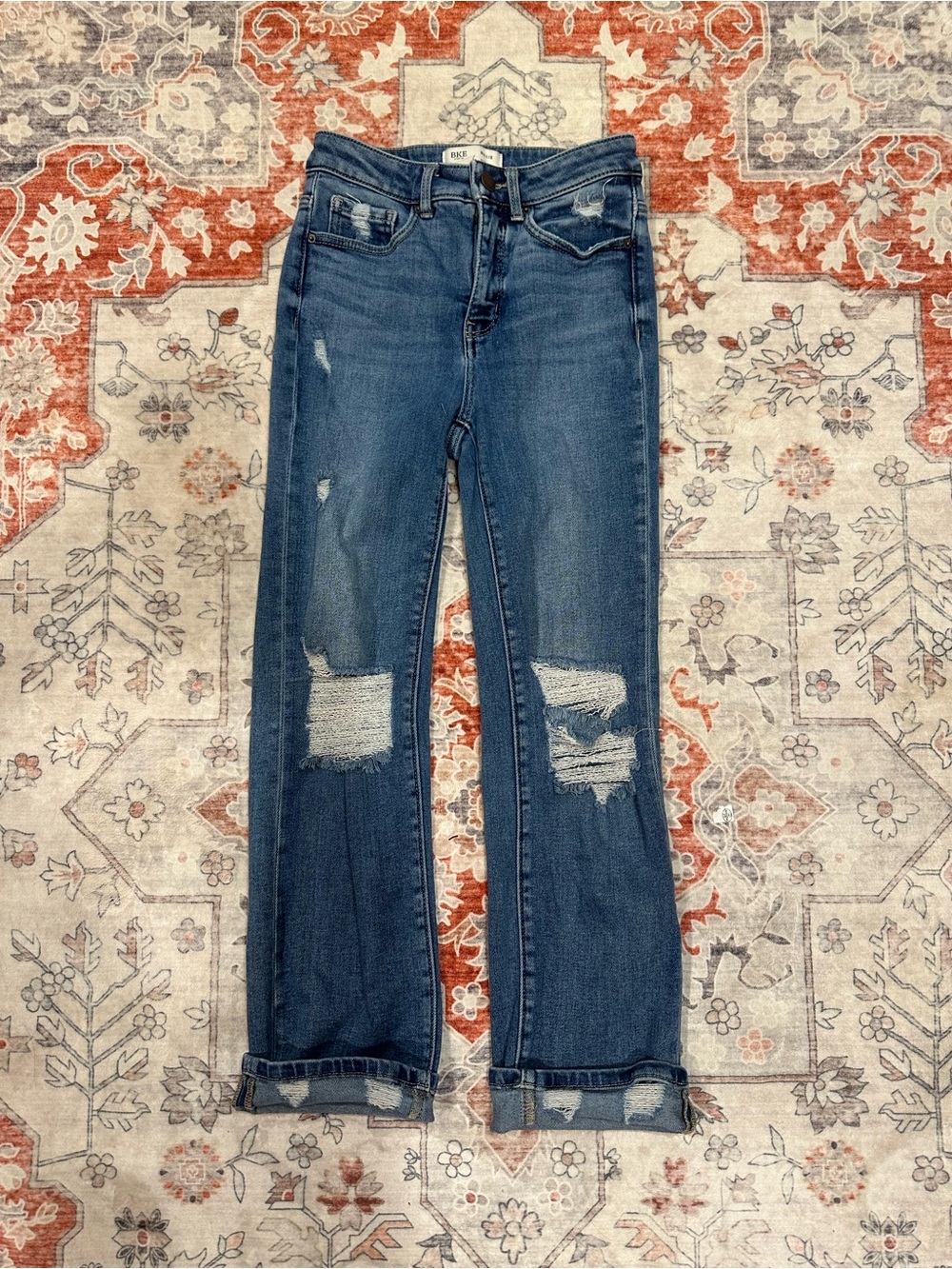 BKE Women's Straight Leg Jeans in Medium Blue with Distressed Knees